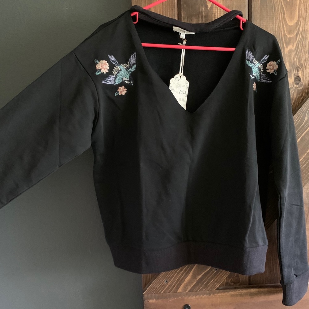 Brand new with tag. Black floral detail sweatshirt